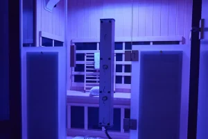 HaloSauna combining infrared sauna, red light therapy, and halotherapy in a private room.